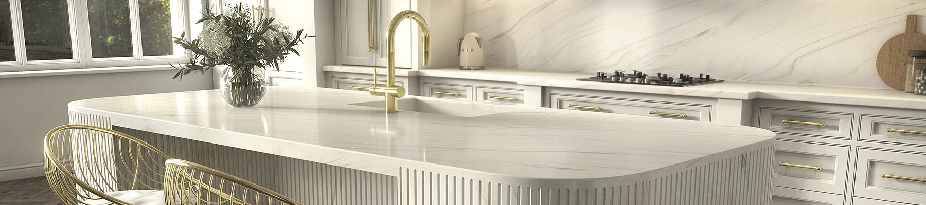 Σύγχρονη κουζίνα με πάγκο και νησίδα από Corian® Calacatta Greige.