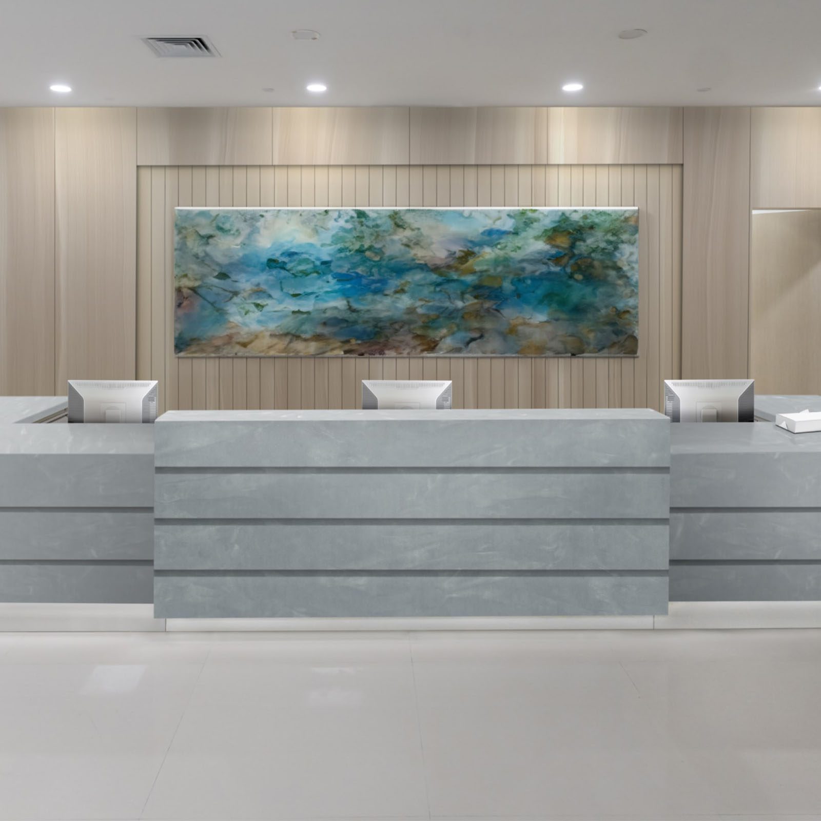 Μοντέρνος χώρος υποδοχής με πάγκο από Corian®, που συνδυάζει αντοχή, λειτουργικότητα και κομψή αισθητική για ξενοδοχεία και επαγγελματικούς χώρους υψηλών απαιτήσεων.